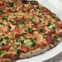 <p>A broccoli and red pepper pizza from Frank Pepe Pizzeria in Danbury.</p>