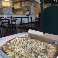 <p>The white clam pie is Frank Pepe&#x27;s specialty.</p>