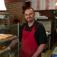 <p>Nonna&#x27;s Manager Shefqet Kabashi behind the counter.</p>