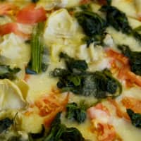 <p>The artichoke spinach tomato pizza at Carmel&#x27;s Pasquale Trattoria.
</p>