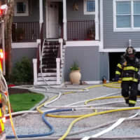 <p>Firefighters used a number of houses to contain the blaze to the area under the house. </p>
