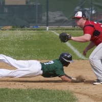 <p>Yorktown&#x27;s Jake Bichler gets back to first safely, as Taylor Brown awaits throw. </p>