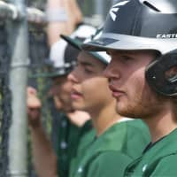 <p>Yorktown players watch from dugout. </p>