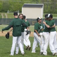 <p>Yorktown coaches and players celebrate their come-from-behind win over Somers.</p>