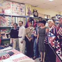 <p>Connecticut Quilts of Valor presents quilts to eight area veterans.</p>