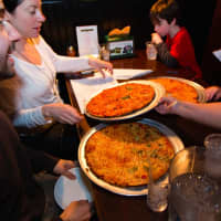 <p>Colony Grill is known for its thin-crust pies.</p>