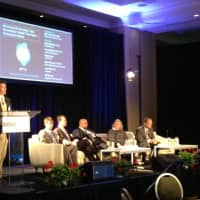 <p>Innovation panel: &quot;Brimming with Innovation: How Westchester&#x27;s Health Tech Hub is Changing the World&quot; at the podium</p>