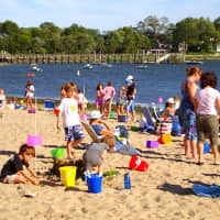 <p>Families relaxing on a bright, sunny day at Weed Beach in Darien. Several Fairfield County communities, including Darien were named among the best suburbs in Connecticut to live in. </p>