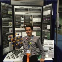 <p>Junior Michael Earle received a third-place award in the physics and astronomy category.</p>