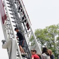 <p>Students had an opportunity to climb the ladder firefighters use.</p>
