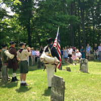 <p>Revolutionary War re-enactors - led by Bill Wienecke - accompanied by a bugler from Boy Scout Troop 376;</p>