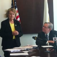 <p>Eileen Heaphy, co-chair of the Animal Control Center Task Force, speaks while Stamford Mayor David Martin looks on.</p>