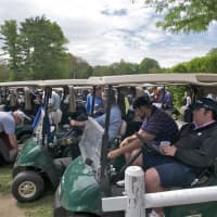 <p>Golfers wait to get on the course at Thursday&#x27;s charity gold outing.</p>