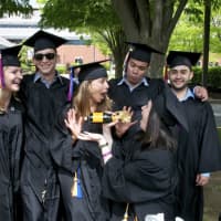 <p>Students have fun just before Thursday&#x27;s graduation ceremonies at Norwalk Community College. </p>