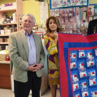 <p>Norwalk Mayor Harry Rilling, left, received a quilt. With him are his wife Lucia and Archie Elam.</p>