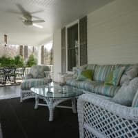 <p>A beautiful front porch awaits a new owner at  276 Quaker Road in Chappaqua.</p>