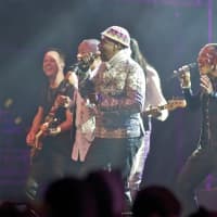 <p>Earth, Wind &amp; Fire performs on the main stage.</p>