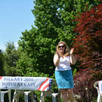 <p>A pro-Hillary presidential election banner is displayed along the parade route in Chappaqua.</p>