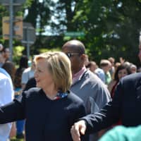 <p>Hillary Clinton waives while marching in New Castle&#x27;s Memorial Day parade in downtown Chappaqua.</p>