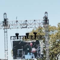 <p>The crowd enjoys the music of the Doobie Brothers, Earth, Wind &amp; Fire and other acts throughout the day.</p>