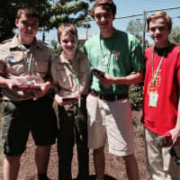 <p>Greenwich Boy Scouts have plenty of poppies to distribute.</p>