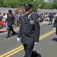 <p>Members of the Weston Fire Department march Monday.</p>