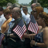 <p>A small crowd attends Monday&#x27;s Seaside Park ceremony. </p>