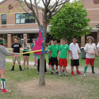 <p>Students learned the symbolism of the traditionally shaped pinata, as well as the significance of breaking it open to allow a downpour of treats for the eagerly awaiting children.</p>
