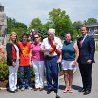 <p>First Selectman, Jayme Stevenson with Grand Marshal Gene Coyle&#x27;s grandson and two daughters with Memorial Speaker, Navy veteran, Chris Pintauro.</p>