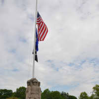<p>Spring Grove Veteran&#x27;s Cemetery Karl Lang statue before noon with flags at half staff.</p>