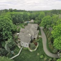 <p>A newly listed home at 64 Old Redding Road in Weston features up-close views of Aspetuck Valley Country Club.</p>