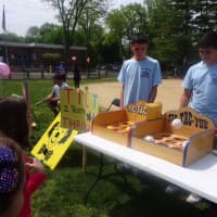 <p>Visitors play a game of tic-tac-toe at the Tuckahoe Junior Carnival.</p>