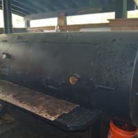 <p>The custom Lang Smoker is cooking away on the back porch at Hoodoo Brown BBQ in Ridgefield. </p>