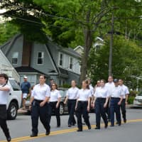 <p>Katonah Bedford Hills Volunteer Ambulance Corps members march in the Memorial Day parade.</p>