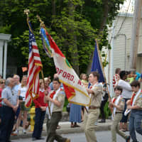 <p>Boy Scouts march in the Bedford Hills Memorial Day parade.</p>