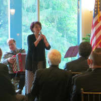 <p>Mary Mancini, accompanied by Mario Tucca, sang &quot;Memories&quot; at Thursday&#x27;s service at Tappan Hill Mansion in Tarrytown for former Westchester County Executive Alfred DelBello, who died on May 15 at the age of 80.</p>