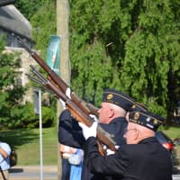 <p>American Legion members fire rounds during a Memorial Day ceremony in Mount Kisco.</p>