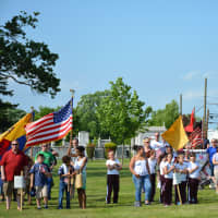 <p>Local groups gather for a  pre-parade ceremony held at a field between Mount Kisco&#x27;s cemeteries.</p>