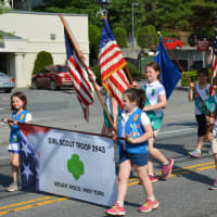 <p>Girl Scouts march in Mount Kisco&#x27;s Memorial Day parade.</p>