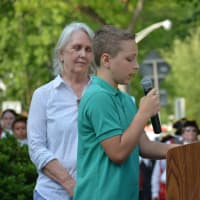 <p>James Antash, a fifth grader at West Patent Elementary School, reads his Memorial Day essay.</p>