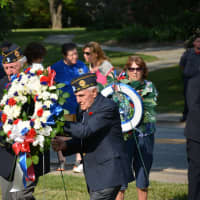 <p>American Legion members present a wreath for Mount Kisco&#x27;s war memorial.</p>