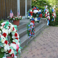 <p>Wreaths and flowers were placed at Mount Kisco&#x27;s war memorial.</p>