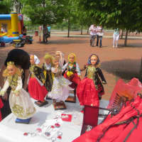 <p>Some of the dolls on sale Sunday, along with traditional hats and T-shirts displaying the Albanian flag.</p>