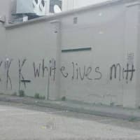 <p>A swastika, KKK and the phrase &quot;white lives matter&quot; is spray-painted on the side of a vacant building at 1280 Stratfield Road in Fairfield. </p>