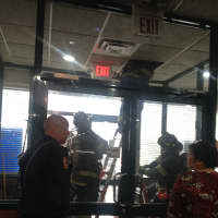 <p>Firefighters at Queen City Buffet in New Rochelle.</p>