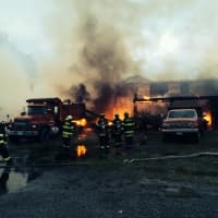 <p>Warehouses at the former Fairfield Lumber erupt in flames late Tuesday.</p>