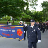 <p>Bedford firefighters march in the Katonah parade.</p>