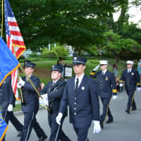 <p>South Salem firefighters march in the Katonah parade.</p>