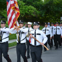 <p>Croton Falls firefighters march in the Katonah parade.</p>