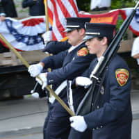 <p>Brewster firefighters march in the Katonah parade.</p>